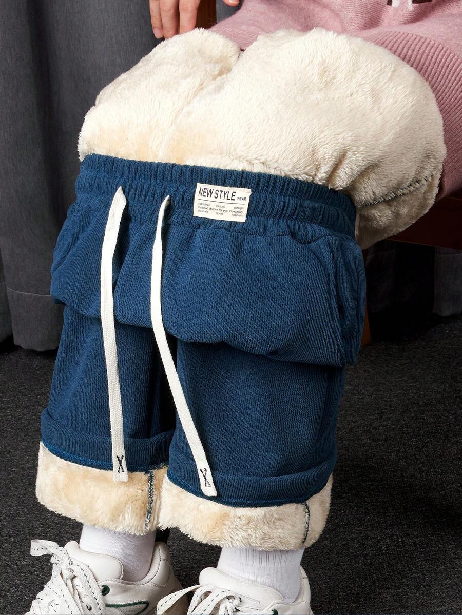 Joggingbukser dame med teddyfor og lige ben, riflet stof og bredt snøre i taljen, Blå