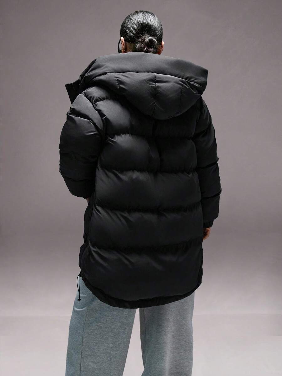 Oversize vinterjakke dame i pufferstil med hætte, store lommer og trykknapper, Sort, billede 2