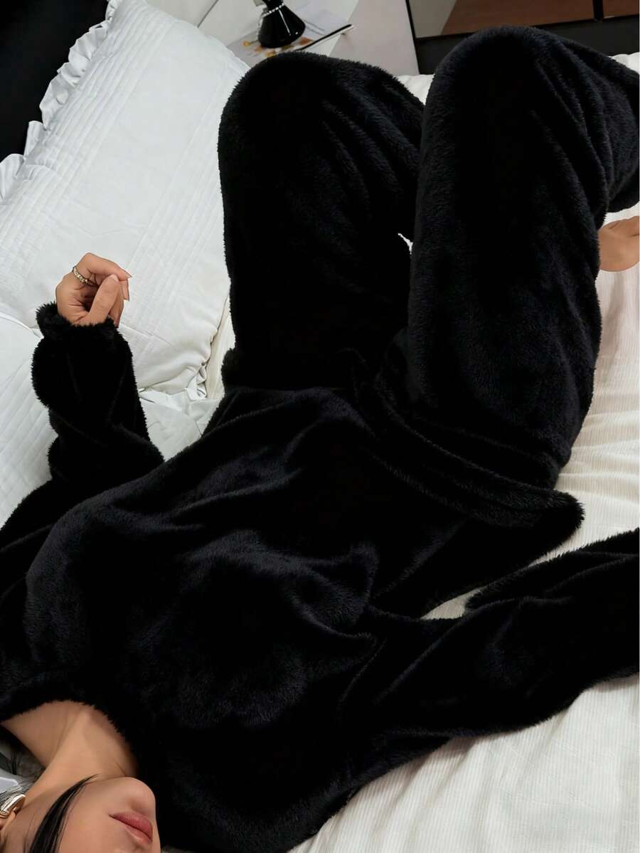 Pyjamas dame i tyk og blød fleece, løs top med rund hals og bukser med elastik, Sort, billede 5
